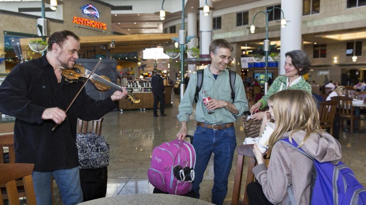 Seattle airport hopes to let friends and family meet passengers at gate — among the first of a new post-9/11 trend?