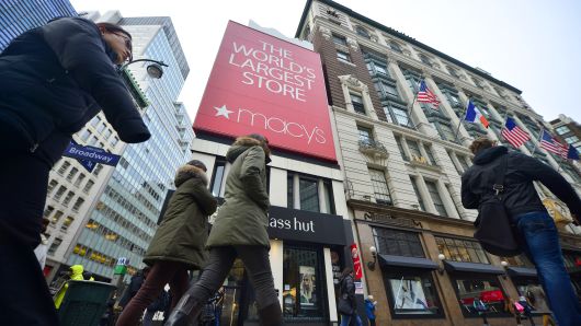 Macy's to cut 100 management jobs, trim $100 million in annual costs as sales continue to slump