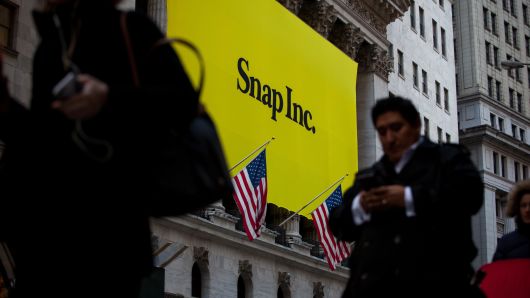 Stocks making the biggest moves midday: Snap, Boston Beer, Duluth Holdings & more