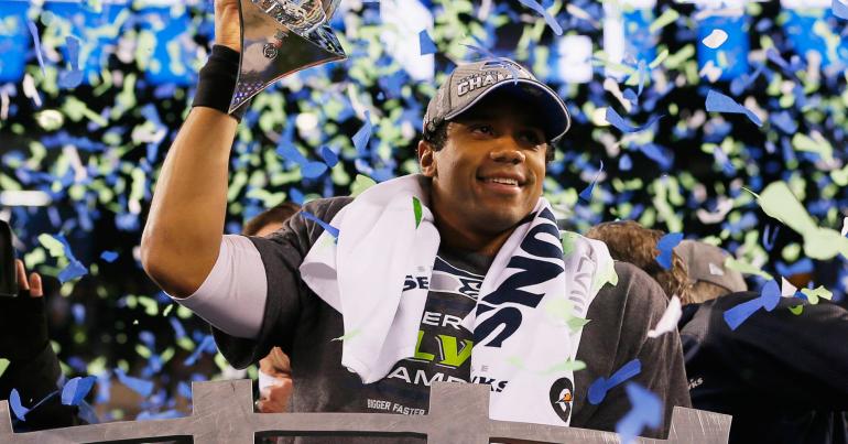 Seahawks quarterback Russell Wilson gives linemen Amazon stock that could be worth a bundle