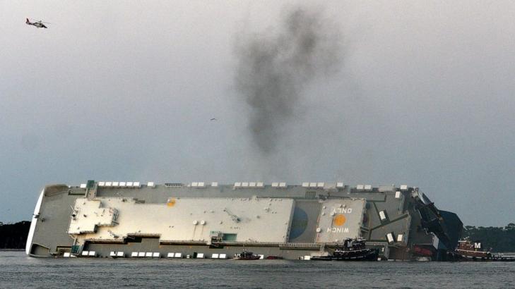 Overturned ship's fuel tanks drained of 320,000 gallons
