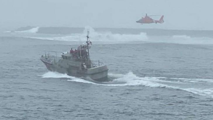3 fisherman dramatically rescued after boat capsizes in 12 foot waves