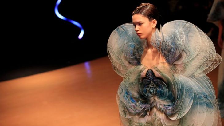 Paris couture climbs Mount Olympus, plumbs marine depths