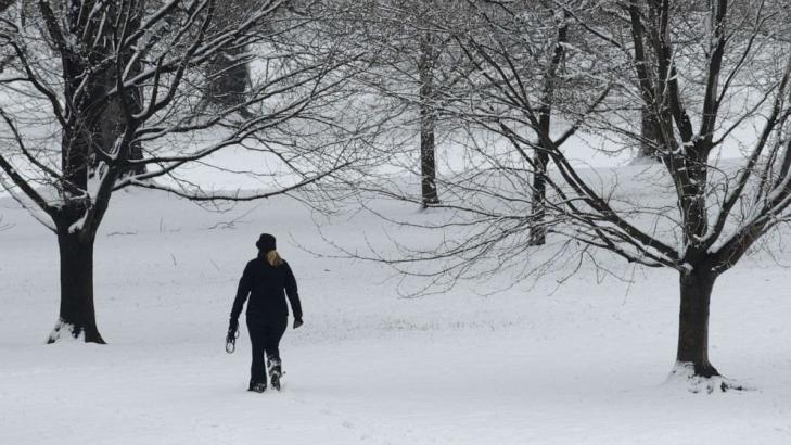 Storm system brings snow from Midwest to Great Lakes