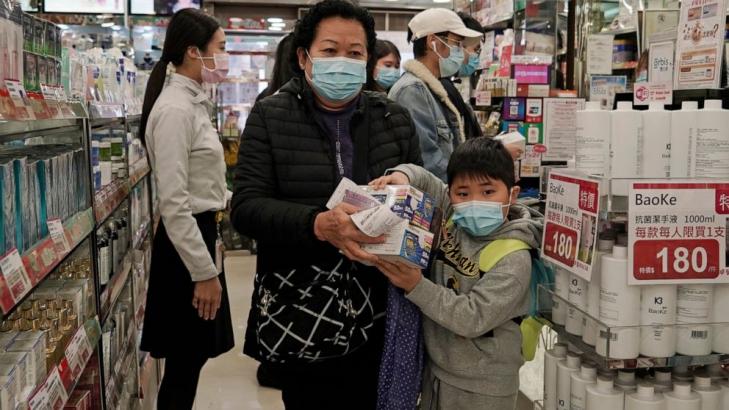 China reports 304 virus deaths, fires officials for poor job