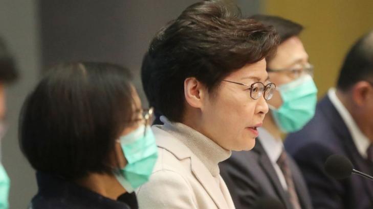 China's virus cases top 20K as Hong Kong closes most borders
