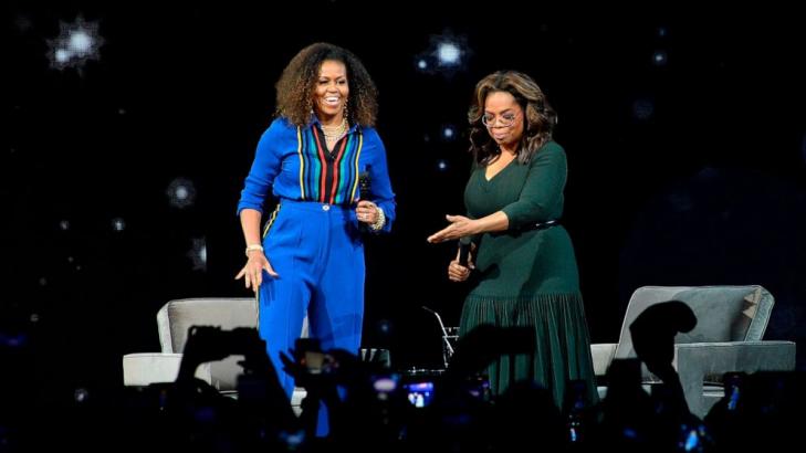 Michelle Obama, Oprah Winfrey headline arena like rock stars