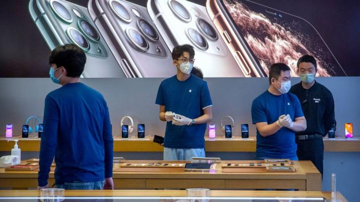 Apple warns China virus will cut iPhone production, sales