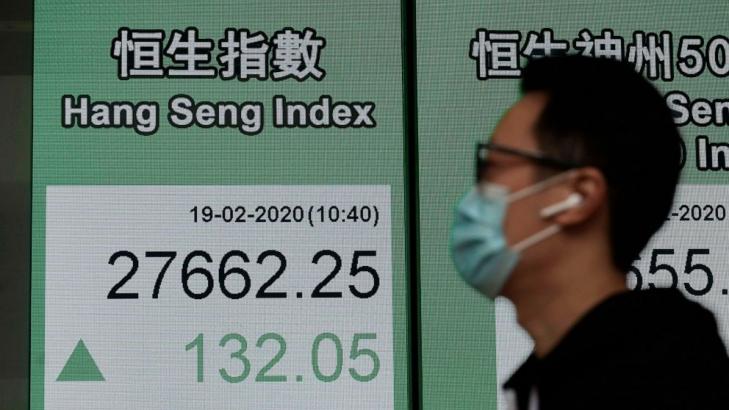 Global shares mostly rise but virus fears continue