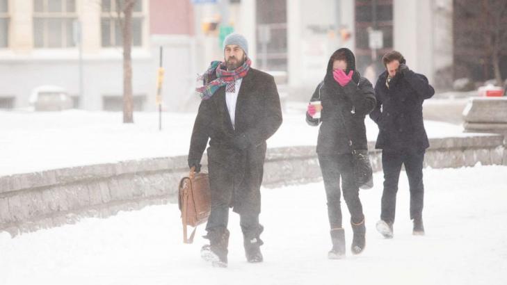 Blizzard pummels New York state as new storm moves into the west