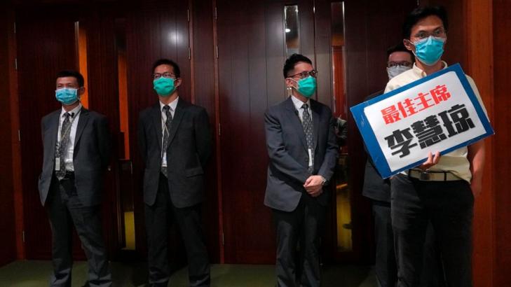 Lawmakers ejected in Hong Kong debate on Chinese anthem bill