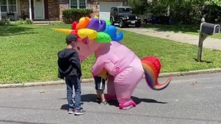 New Jersey grandma wears colorful unicorn costume to greet her grandkids during coronavirus pandemic