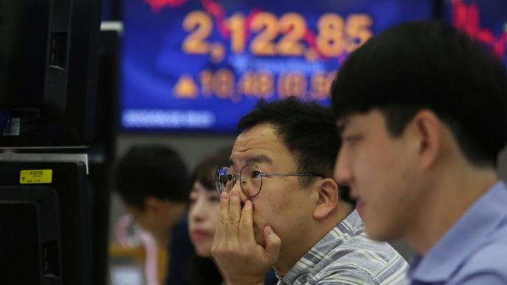 Asian stocks follow Wall Street higher on bank news