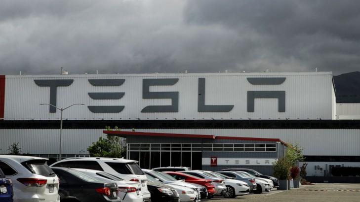 Workers: Tesla threatens firing if they don't return to jobs