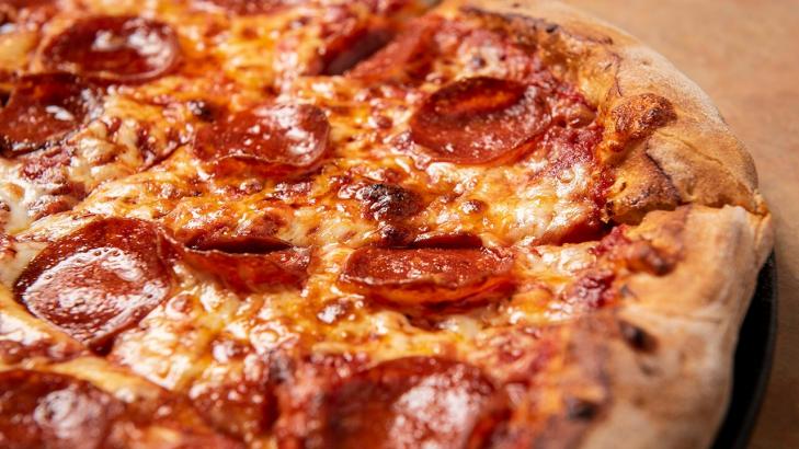 Delaware pizza store owner foils robbery by throwing pie at suspect, cops say