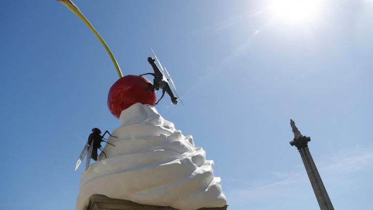 Ominous whipped cream art comes to London's Trafalgar Square