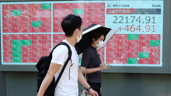 Asian shares mixed on US-China tensions, Wall Street gains