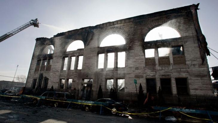 Wind knocks down wall of fire-gutted historic Chicago church