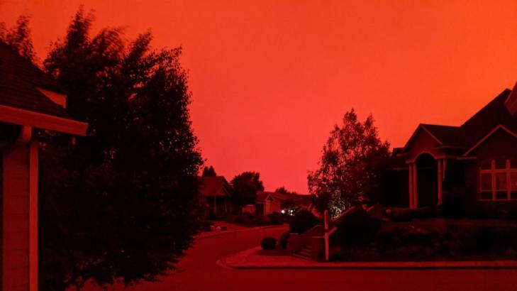 Massive smoke clouds, thick air darken Western US skies