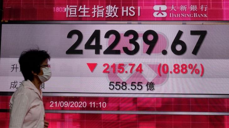 Asian shares track Wall Street retreat on pandemic pains