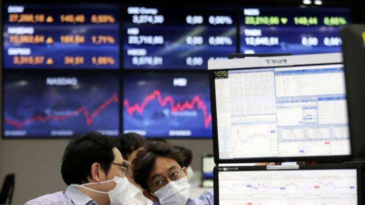 Asian shares mixed as worries percolate over pandemic