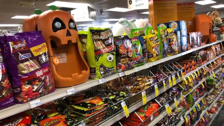 Americans load up on candy, trick or treat - or not