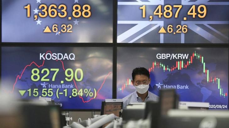 Asian shares fall as caution sets in after Wall St retreat