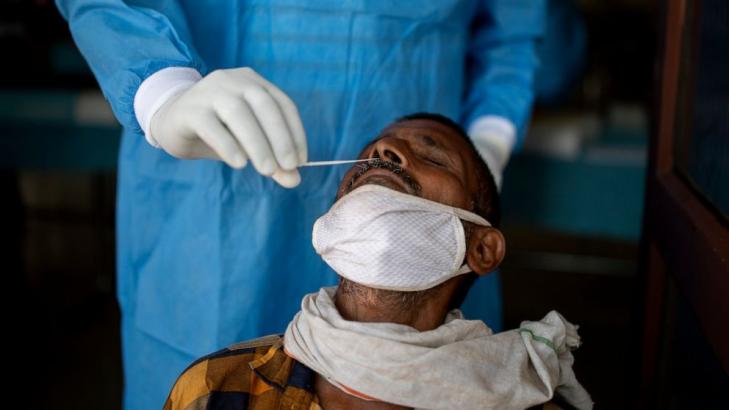 The Latest: India edges closer to 7 million virus cases