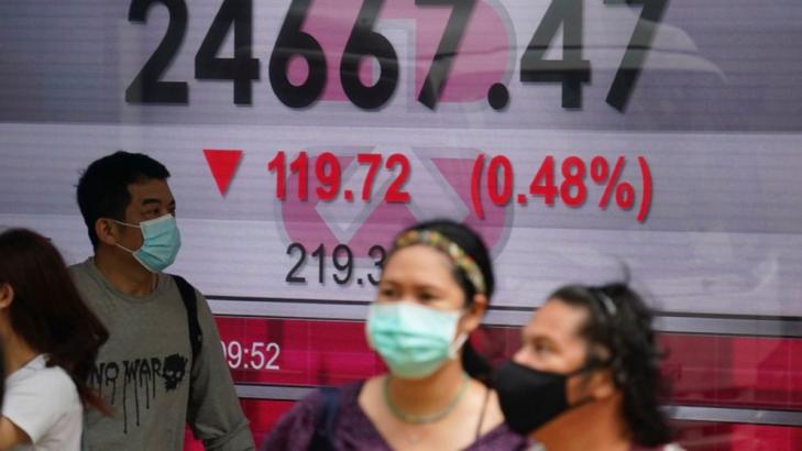Asian stocks mostly higher despite worries over virus cases