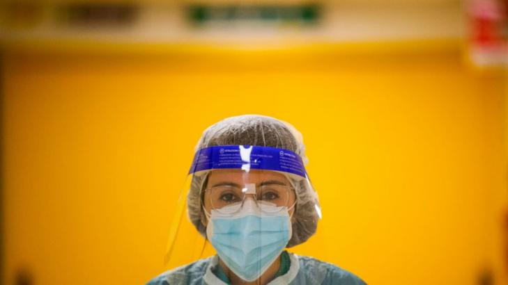 AP PHOTOS: Virus ward doctor runs from dawn to dark in Italy