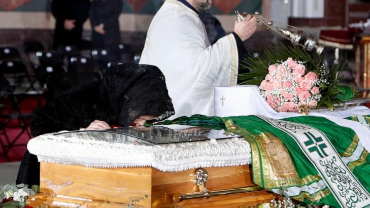 Serbian patriarch buried with few virus measures in place