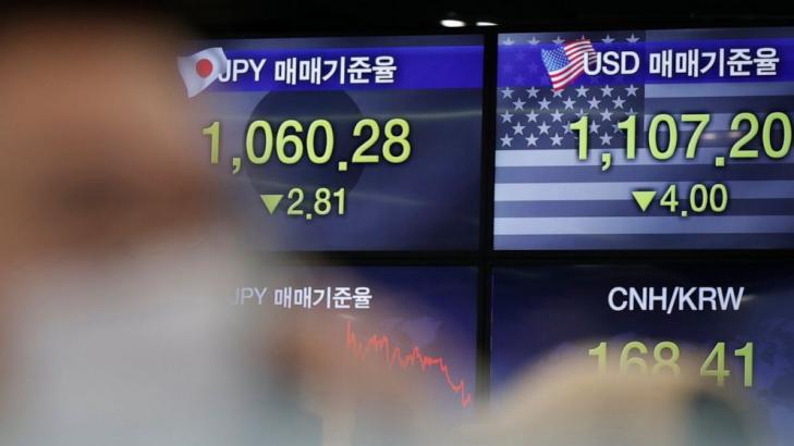 Asian shares mixed after Wall Street takes pause on optimism