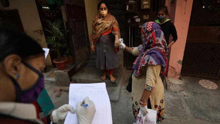 The Latest: India's capital mulls curfew amid virus surge
