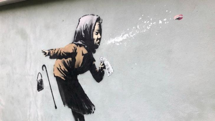 UK homeowner delays sale of home after Banksy mural appears