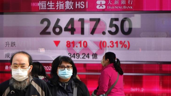 Asian shares skid despite US economic stimulus deal