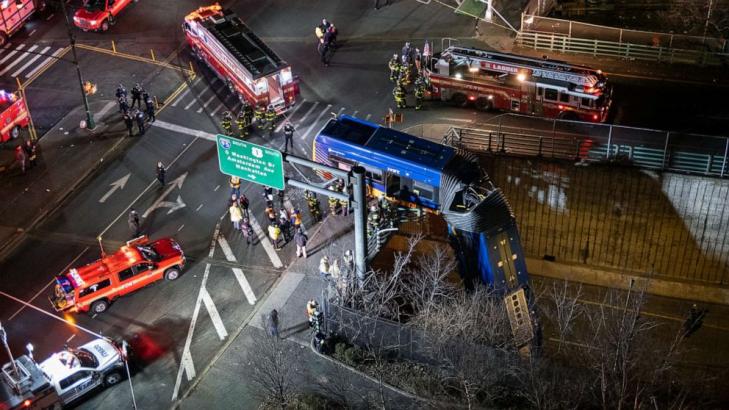 9 injured after NY passenger bus drives off overpass in the Bronx, is left hanging
