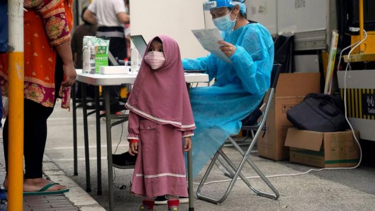 Thousands of Hong Kongers locked down to contain coronavirus