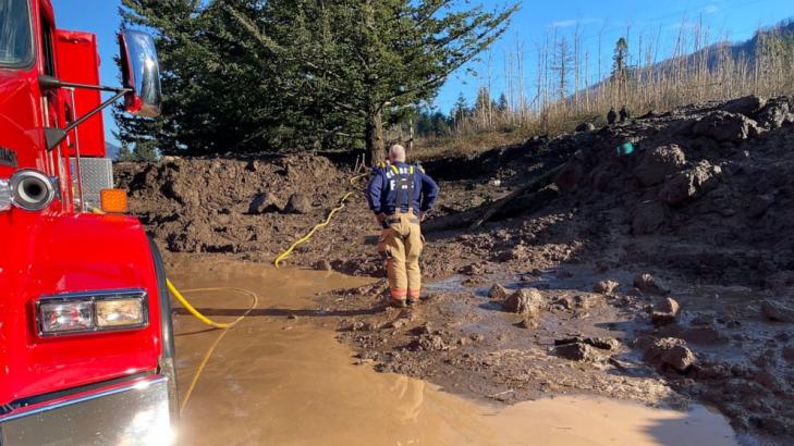 Woman's body found under 15 feet of debris 10 days after car swept away in landslide