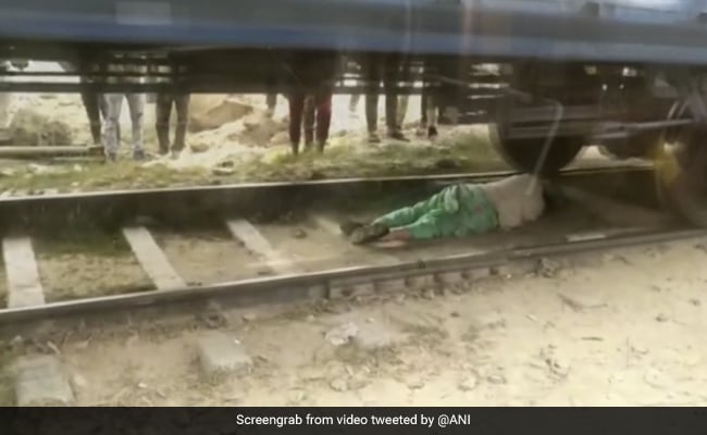 Watch: Rohtak Woman Lies Low Under Moving Train, Escapes Being Run Over