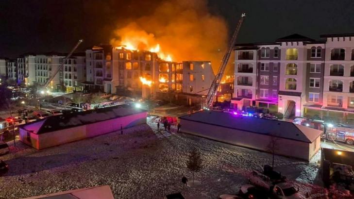 Apartment complex burns for 14 hours as firefighters grapple with empty hydrants