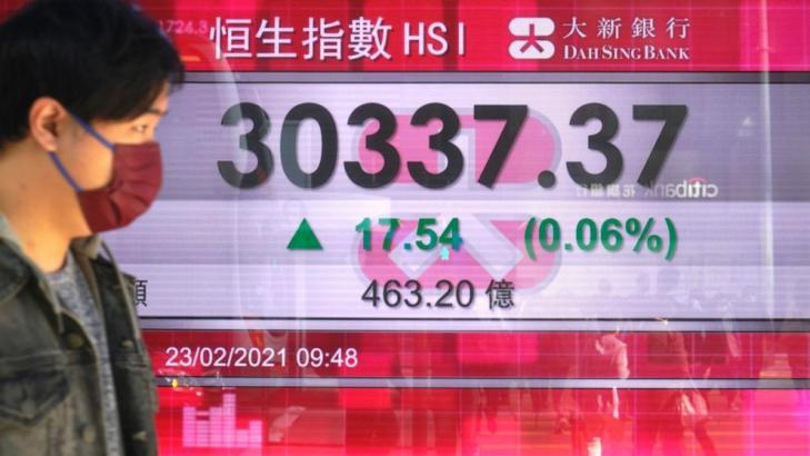 Asian shares mixed amid vaccine optimism, US tech sell-off