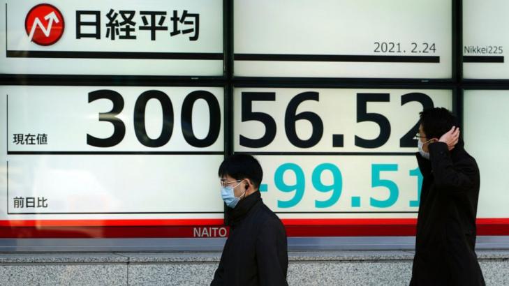 Asian shares slip on jitters over inflation, interest rates