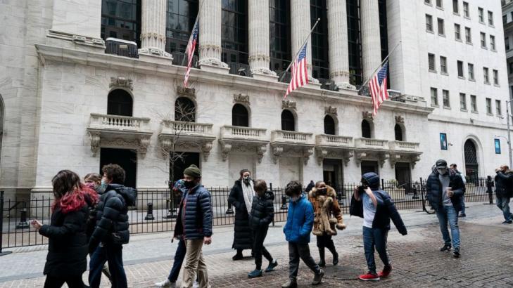 Global stocks follow Wall Street higher after Fed pledge