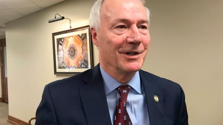 Arkansas governor signs near-total abortion ban into law