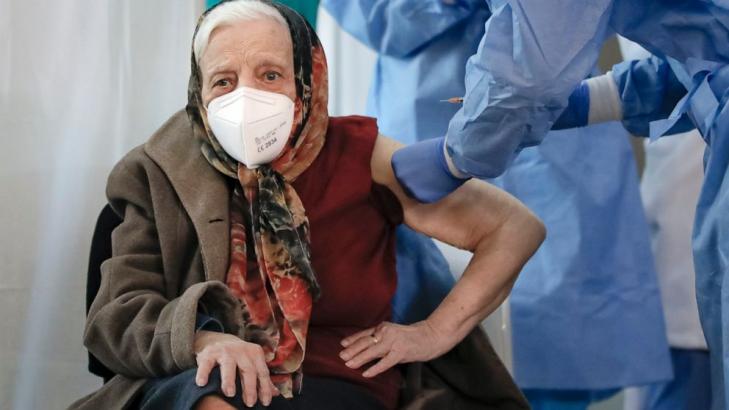Romanian woman, 104, says vaccine "only way" to end pandemic