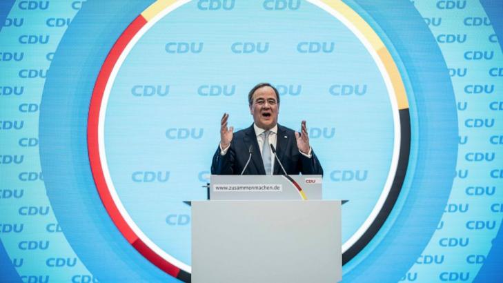 Leader of Merkel's party vows to boost German voters' trust
