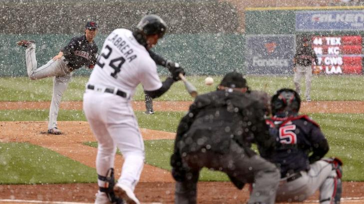 MLB's opening day marked by a COVID-19 postponement, weather impacts and limited fans