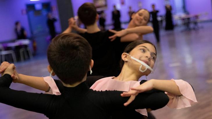 AP PHOTOS: Italy ballroom dancers twirl through lockdown