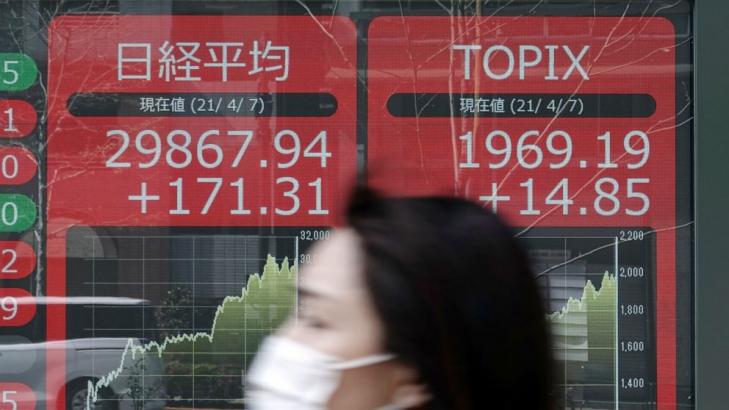 Asian stocks mixed after lackluster day on Wall Street