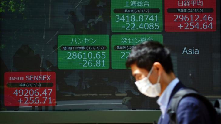 Asian stocks mixed in muted trading, echoing Wall St close